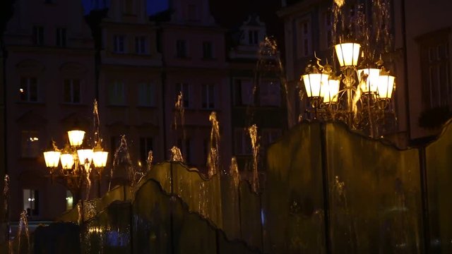 Lanterns and fountain at night