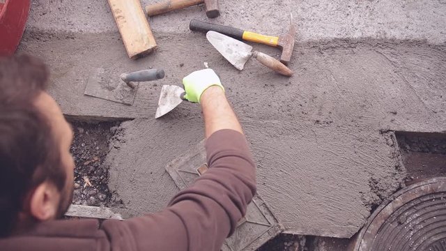 Renovating concrete pavement in home / budget DIY version.