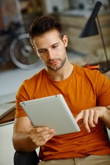 Young man with tablet