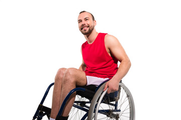 Fototapeta na wymiar Smiling sportsman in wheelchair