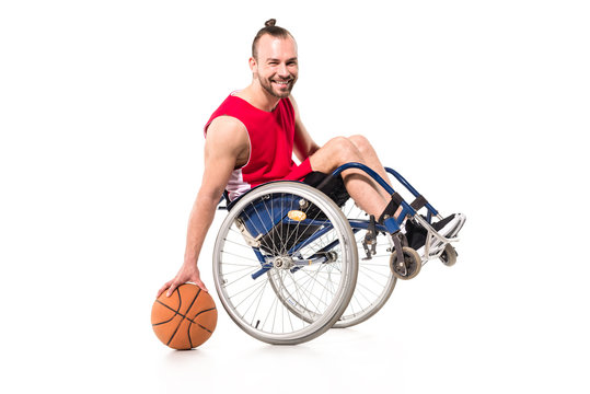 sportsman in wheelchair playing basketball