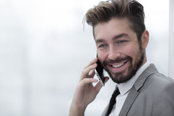 Business man talking on mobile phone