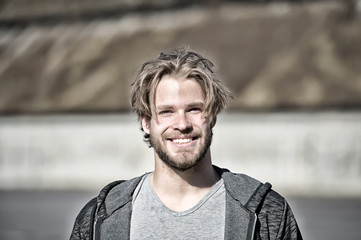 Guy with bearded face and blond hair haircut happy smiling