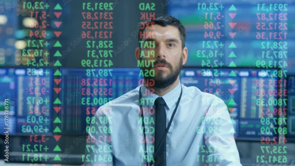Aufkleber Stock Market Top Trader Looks at Projected Ticker Numbers and Graphs Running, Analysing Data to Make Best Sell. Behind Him Room Full of Screens and Statistics. 