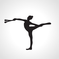Fototapeta na wymiar Silhouette of art rhythmic gymnastic girl with clubs