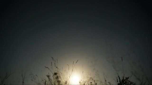 Time lapse moon in sky