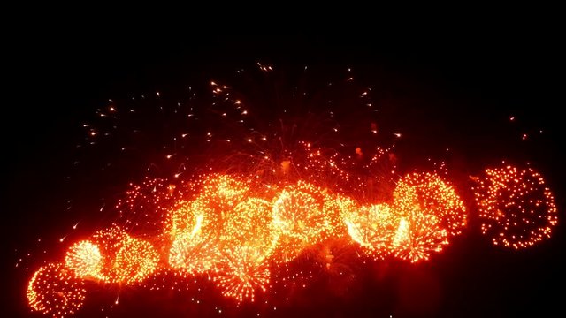 Firework display at night on black background. Bright red green yellow explosions. Amazingly beautiful. Salute for new year Christmas and other holidays. Macro video closeup footage 4k.