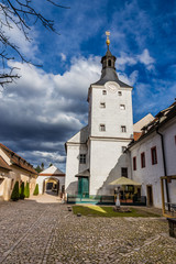 Fototapeta na wymiar Courtyard And Tower Of Dobrichovice Castle