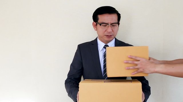 asian businessman receive a postmail brown box  repeat business ideas concept