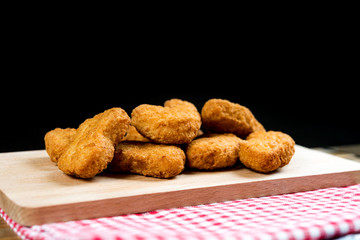 fried chicken nuggets on table