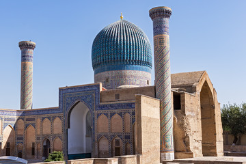 Fototapeta na wymiar Gur-e Amir mausoleum of Timur - Samarkand, Uzbekistan. His architectural complex with its azure dome contains the tombs of Tamerlane, his sons and grandsons.