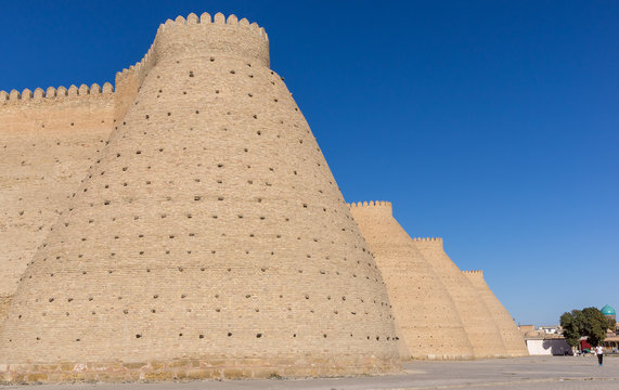 Wall of the massive Ark fortress, located in the city of Bukhara, Uzbekistan. The Ark is a large earthen fortification located in the northwestern part of contemporary Bukhara