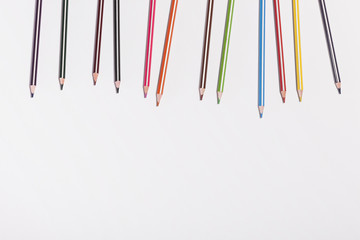 colorful pencils on the white background.