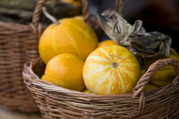 Pumpkins and corn in baskets seasonal Halloween decor
