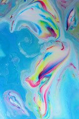 Abstract image of a penguin painted on fluid abstract background, kretivny background with a pattern penguin, multi-colored pattern with a symbol of a penguin