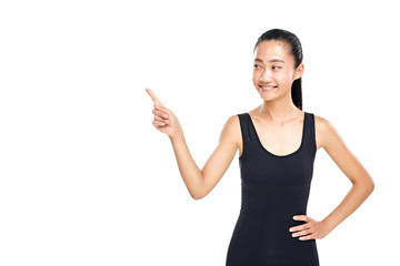 Asian woman foxy smiling and pointing finger at something