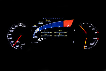 Modern light car mileage on black background 42 MPH