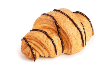 croissant decorated with chocolate sauce isolated on white background, top view