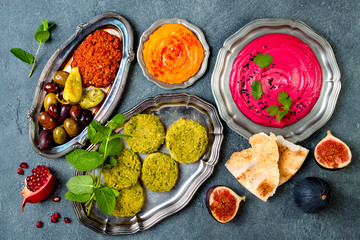 Middle Eastern traditional dinner. Authentic arab cuisine. Meze party food. Top view, flat lay,...
