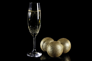 Christmas balls and champagne glass