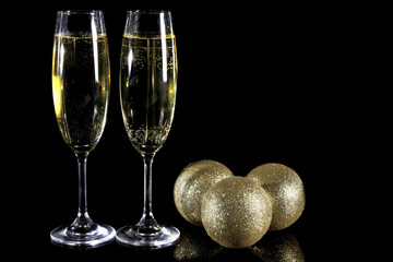 Christmas balls and champagne glasses