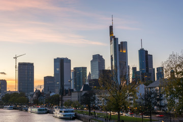Fototapeta na wymiar Lit Skyline of Frankfurt close up after sunset with beautiful sky