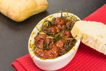 appetizer of cherry tomatoes baked in olive oil and sugar