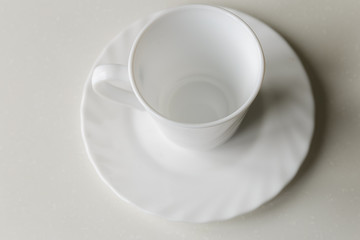 Top view of empty coffee cup and saucer. Crockery for coffee and tea.