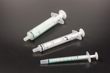 plastic syringe without hypodermic needle