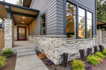 Luxurious home design with modern curb appeal in Bellevue. - Powered by Adobe