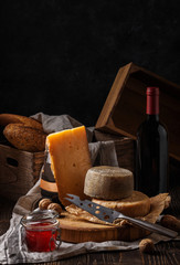 Composition with cheese, bread and wine