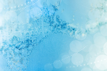 Winter patterns holiday ice background. Icy snowflakes. Beautiful Christmas and New year Christmas...