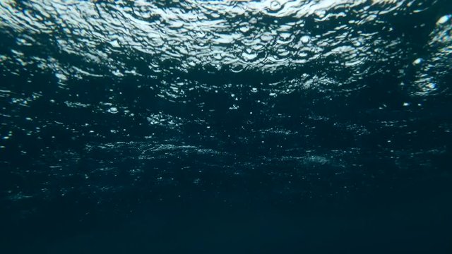 tropical rain in the ocean (view from under water)
