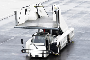 Passenger ladders for boarding passengers in an airplane.