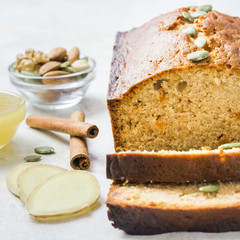 Christmas honey ginger sliced loaf bread and ingredients. Selective focus, space for text.