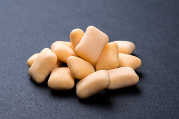 Close up chewing gum on black