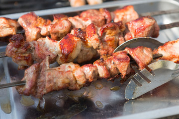 Street fast food festival, beef and pork kebab at grill