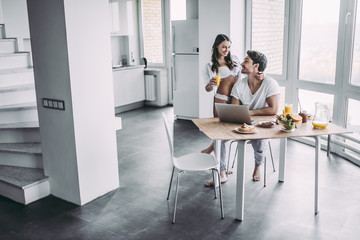 Couple on kitchen