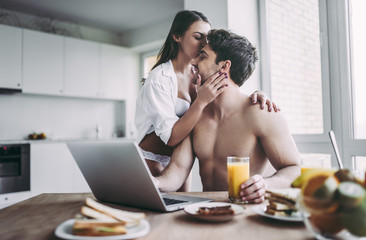Couple on kitchen