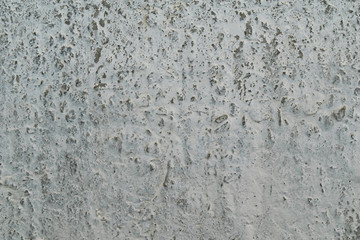 Cracked gray concrete wall background