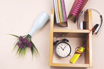 Things fall from the shelves due to the fact that the headphones play music