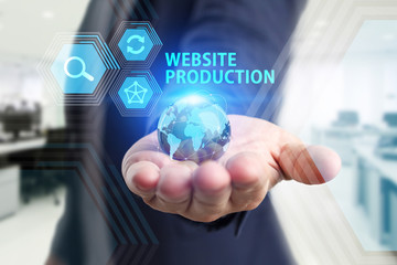 The concept of business, technology, the Internet and the network. A young entrepreneur working on a virtual screen of the future and sees the inscription: Website production