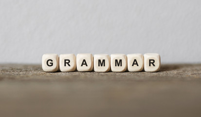Word GRAMMAR made with wood building blocks