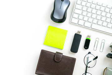 Flat lay, top view office table desk frame. feminine desk workspace with laptop, diary, succulent, glasses, watch on white background.