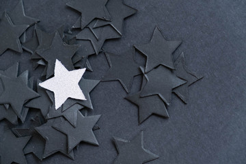 Individuality concept stars on black background