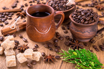 grains of black coffee on the wooden table