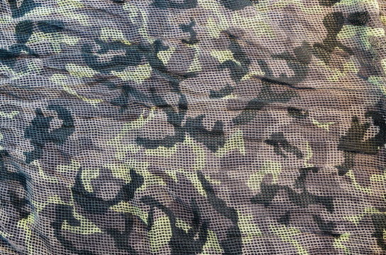 Camouflage on black background