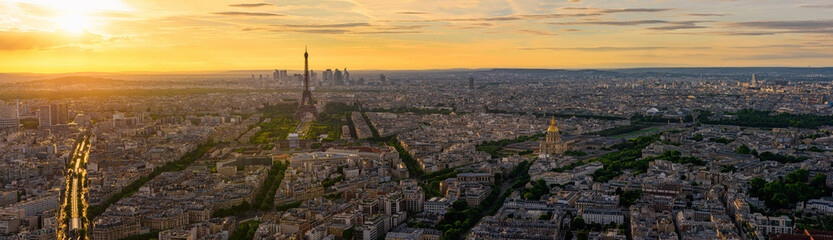 Naklejka premium Skyline of Paris with Eiffel Tower in Paris, France. Panoramic sunset view of Paris
