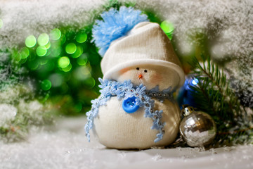 Fototapeta na wymiar Hand made snowman, Christmas tree, new year toys. 2018