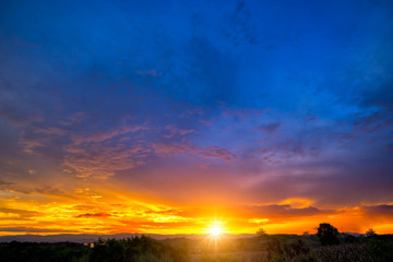 Natural Sunset Sunrise Over Field Or Meadow.